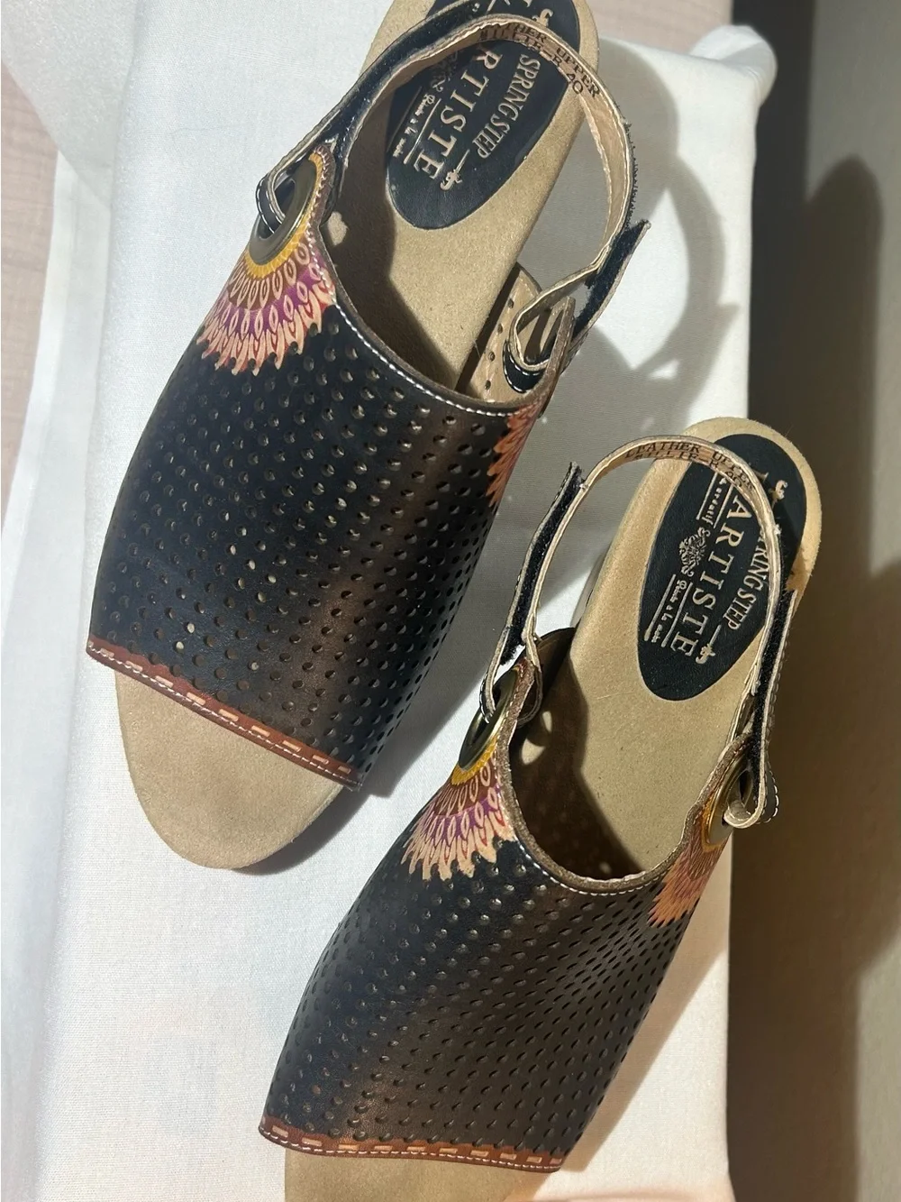 Perforated Slingback Block Heel Sandal in Black with Decorative Medallion